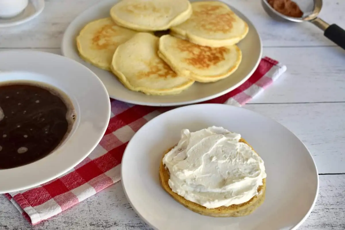 Mascarpone filing spread on top of the coffee soaked pancake. 