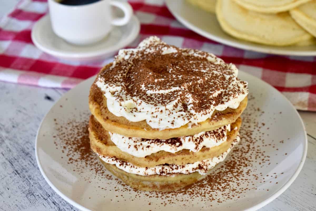 Tiramisu Pancakes on a white plate. 