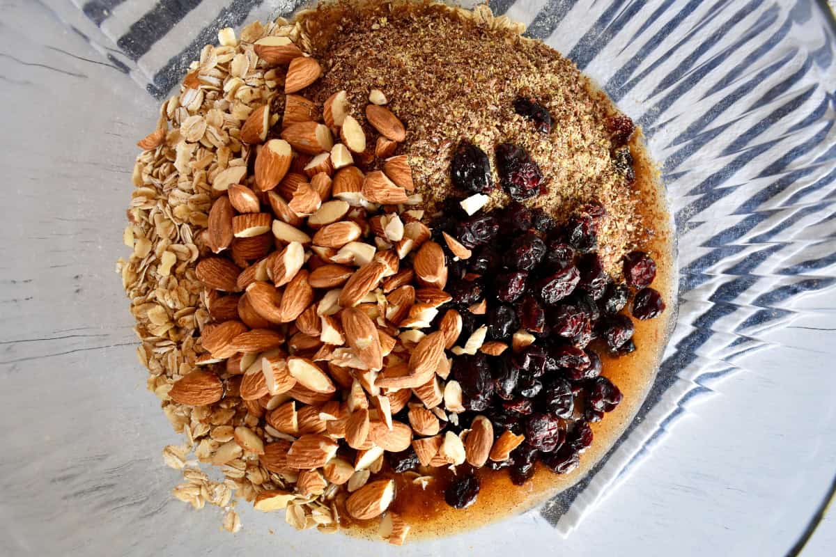 Rolled oats, cranberries, flaxseed, and almonds mixed in with the wet ingredients.