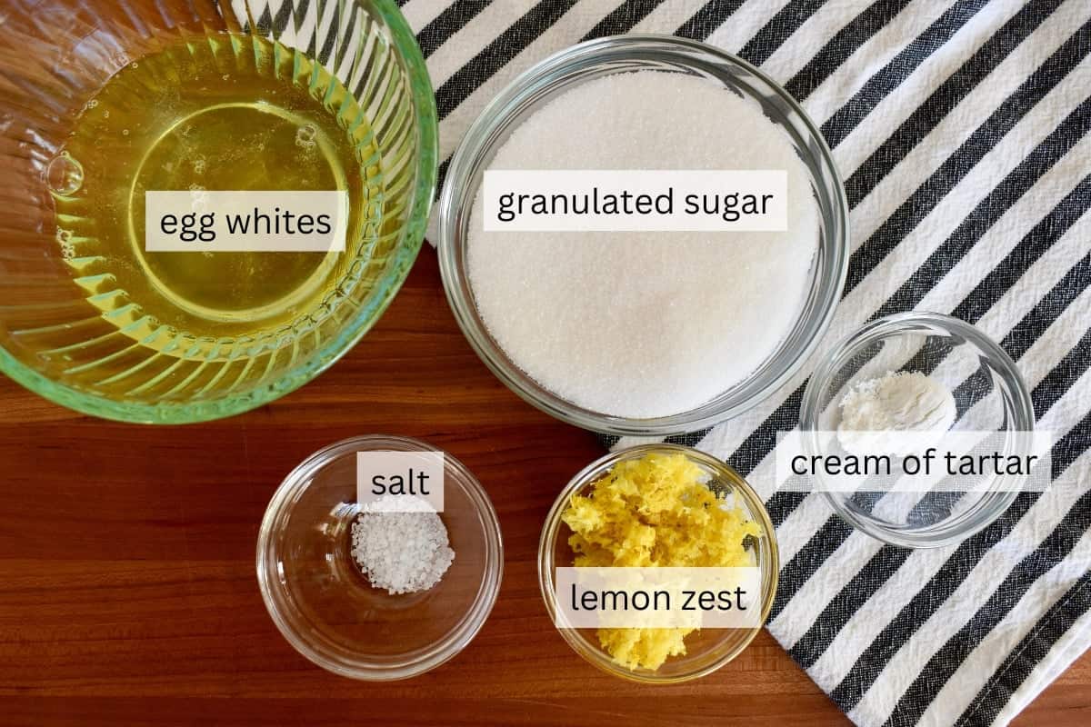 Ingredients include egg whites, sugar, zest, salt, and cream of tartar.