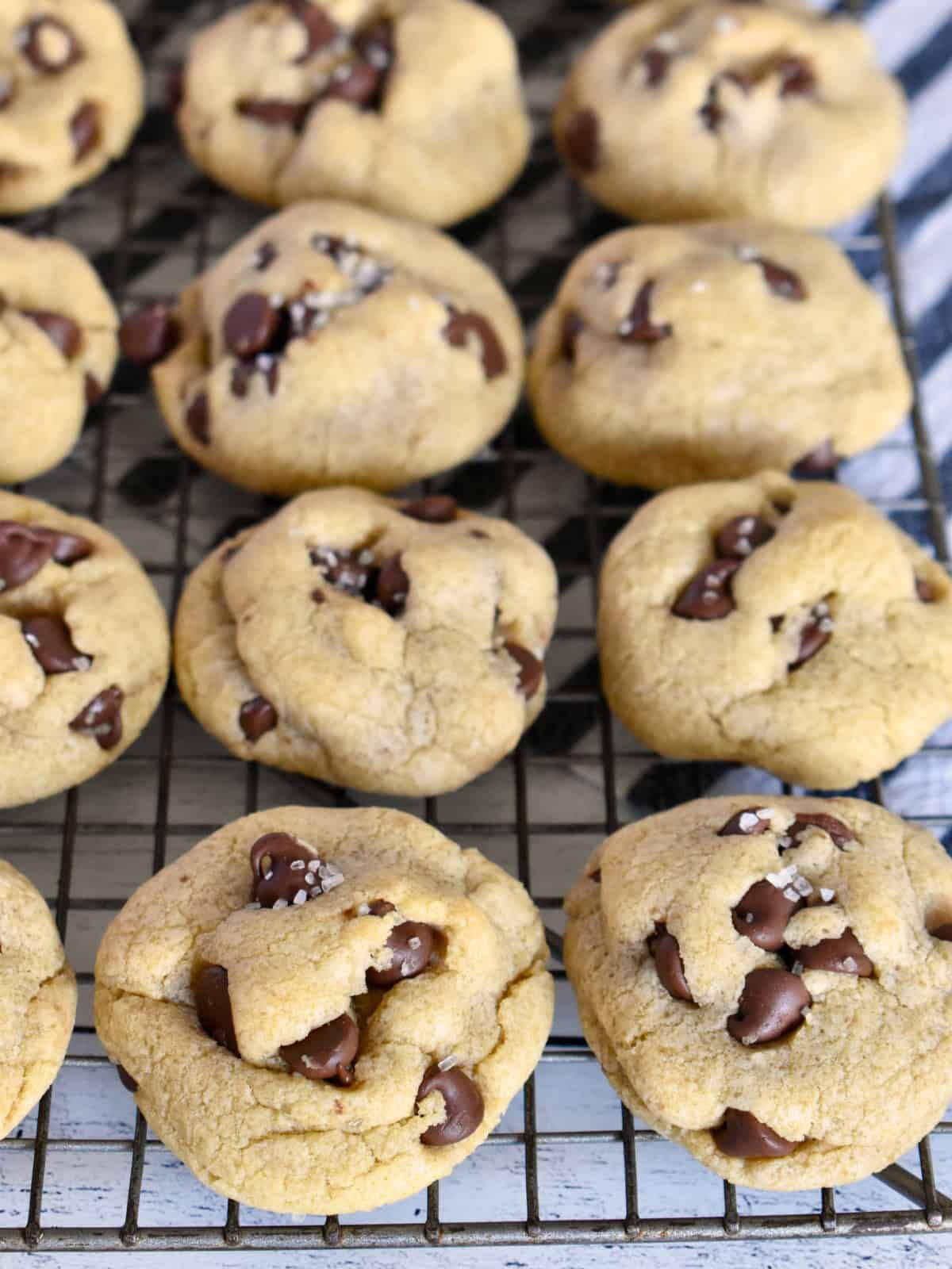 Olive Oil Chocolate Chip Cookies on a baking rack.