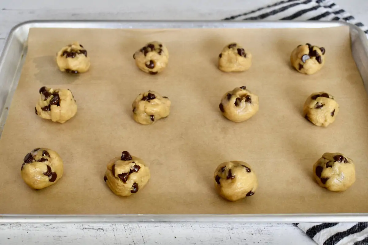 Balls of dough on a baking sheet.