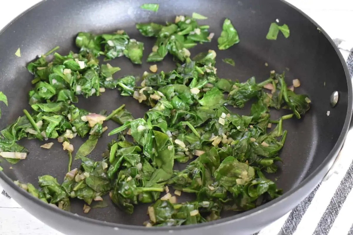 Cooked vegetables in a nonstick skillet. 