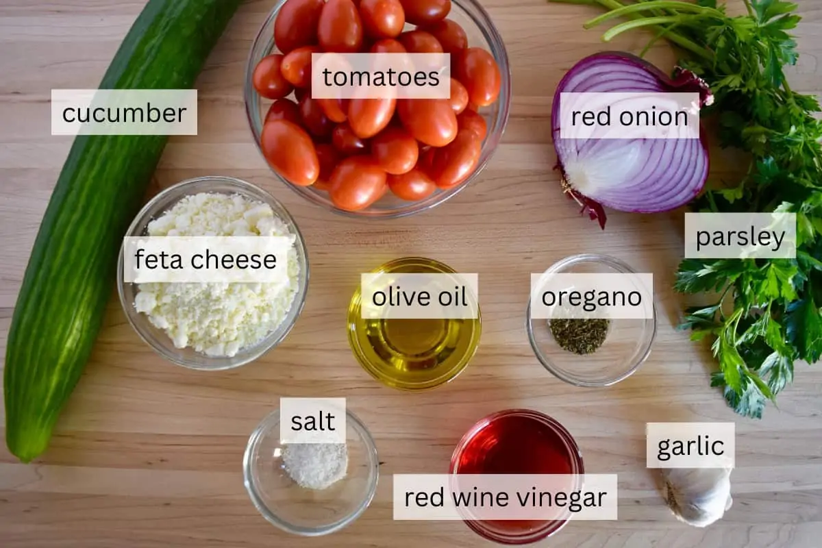 Labeled ingredients on a wood cutting board.