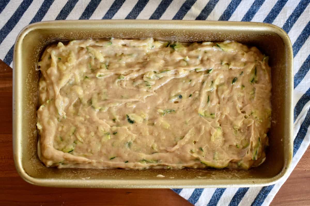 Batter spread into a 9x5 inch loaf pan.