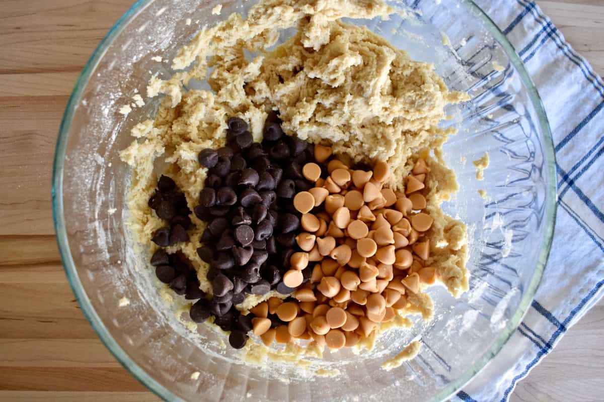 Batter in a bowl with chips on top. 