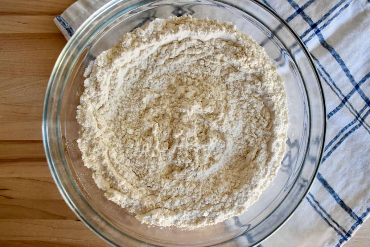 Dry ingredients mixed together in a glass bowl. 