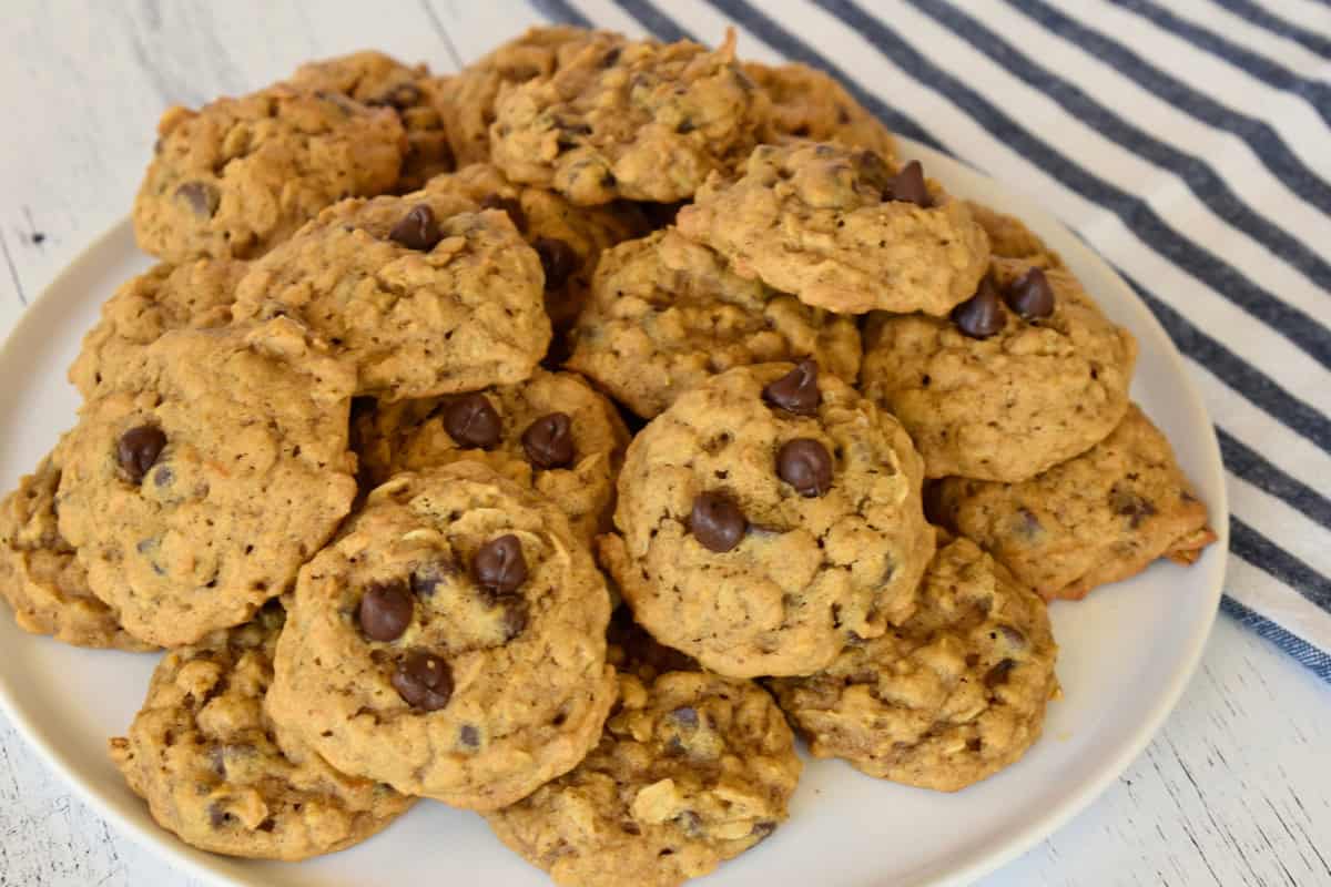 Pumpkin Oatmeal Chocolate Chip Cookies on a white plate.
