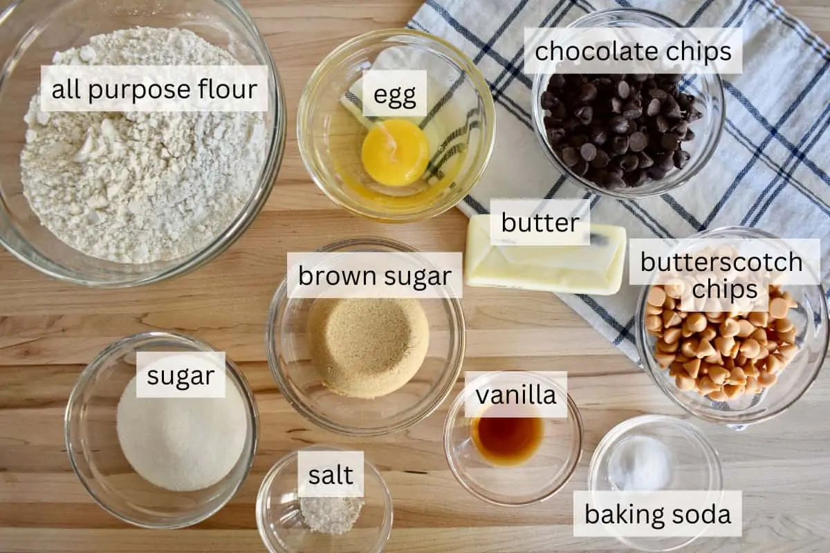 Ingredients for recipe on a countertop including flour, eggs, and vanilla. 