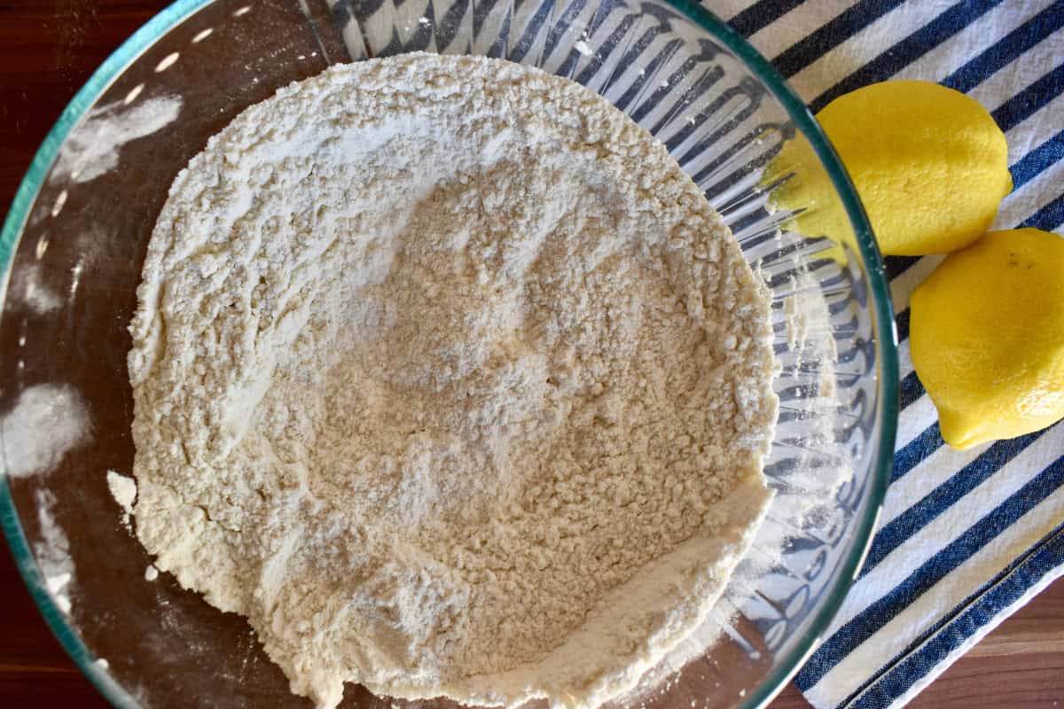 Dry ingredients mixed together in a large glass bowl.